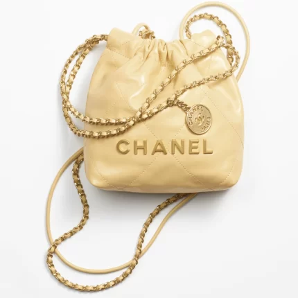CHANEL / CHANEL 22 MINI HANDBAG Shiny Calfskin & Gold-Tone Metal Yellow Ref.  AS3980 B08037 NQ387